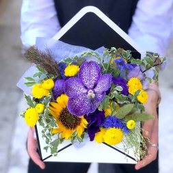 Arrangement of Yellow-Purple Flowers in Envelope