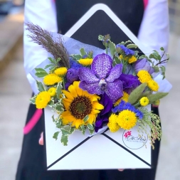 Arrangement of Yellow-Purple Flowers in Envelope