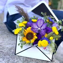 Arrangement of Yellow-Purple Flowers in Envelope