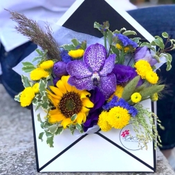 Arrangement of Yellow-Purple Flowers in Envelope