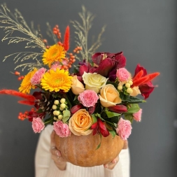 Composition of Autumn Flowers in Pumpkin