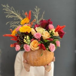 Composition of Autumn Flowers in Pumpkin