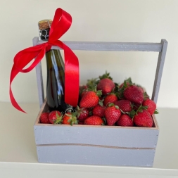 Crate with Strawberries and Champaigne