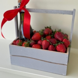 Crate with Strawberries and Champaigne