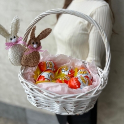 Basket with Kinder Joy Eggs and Rabbits